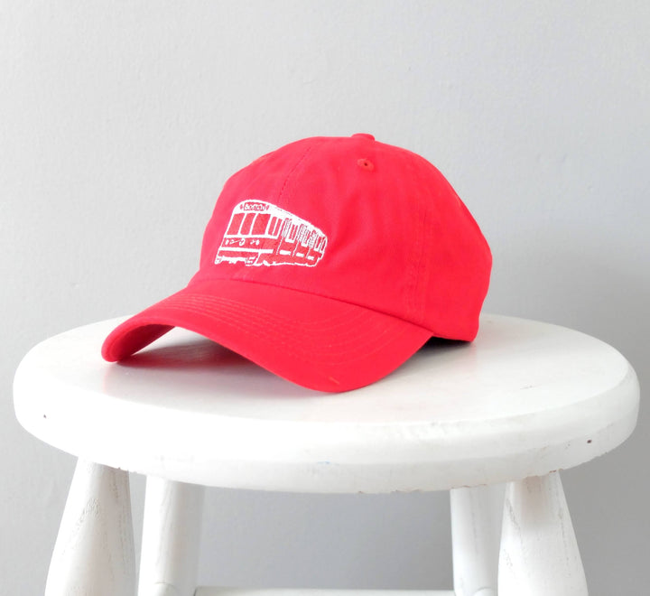 red youth baseball hat with embroidered MBTA red line train