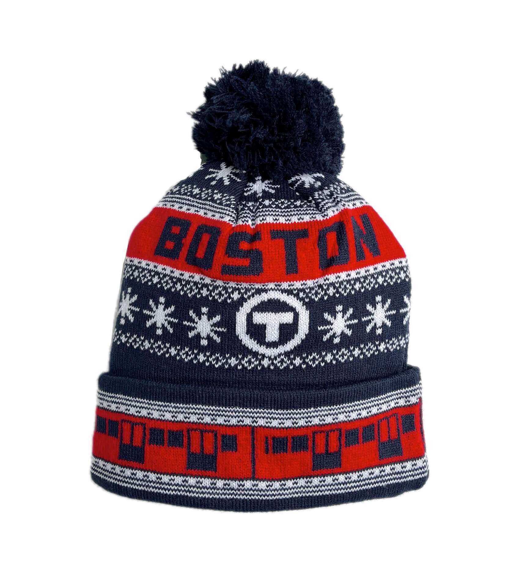 A navy blue adult knit beanie with a matching pom-pom, featuring 'BOSTON' in red and white, a circular 'T' logo, and a red and white MBTA train pattern on the cuff.