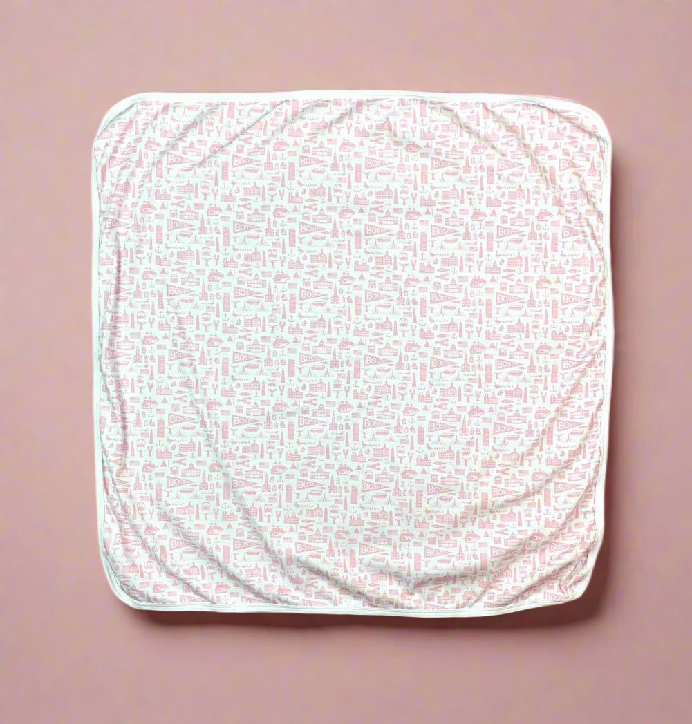 White cotton baby blanket with pink Boston Massachusetts landmark pattern