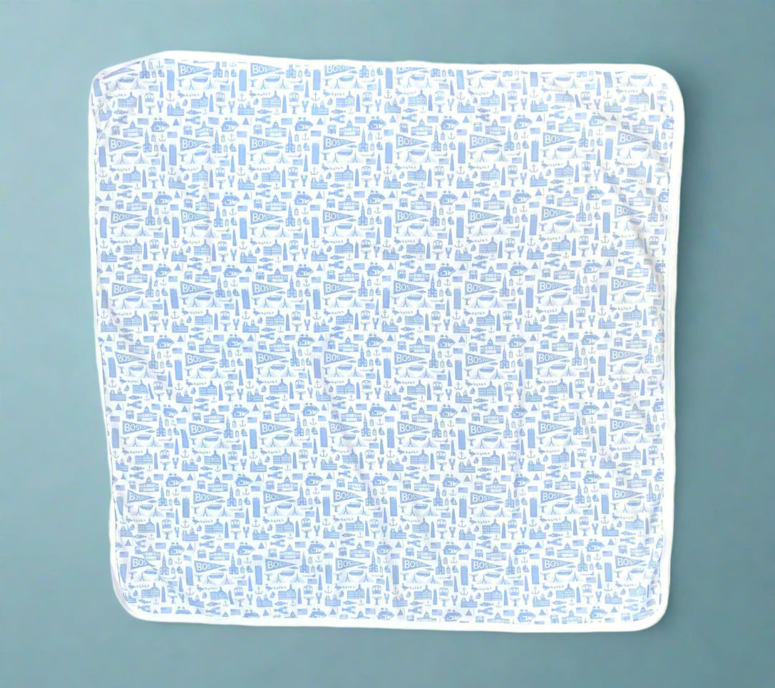 White cotton baby blanket with blue Boston Massachusetts landmark pattern