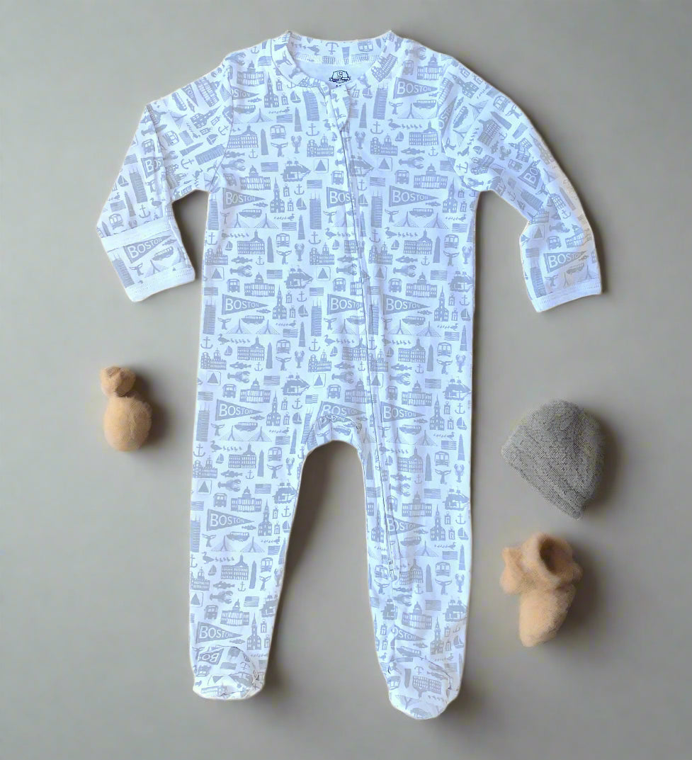 White zippered footie onesie with grey Boston Massachusetts landmark pattern