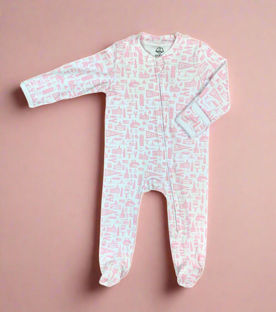 White zippered baby onesie with pink Boston Massachusetts landmark pattern