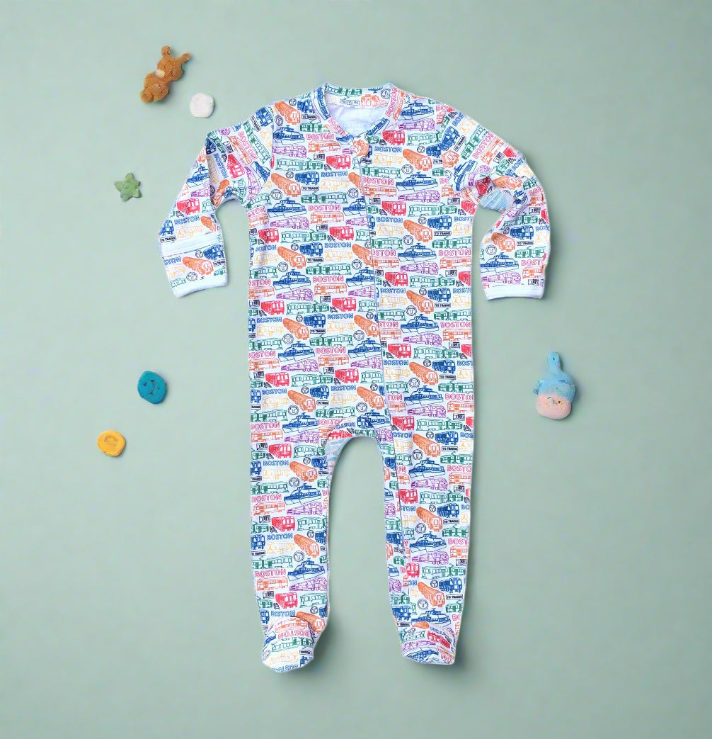 White cotton footie romper with colorful Boston MBTA vehicles pattern