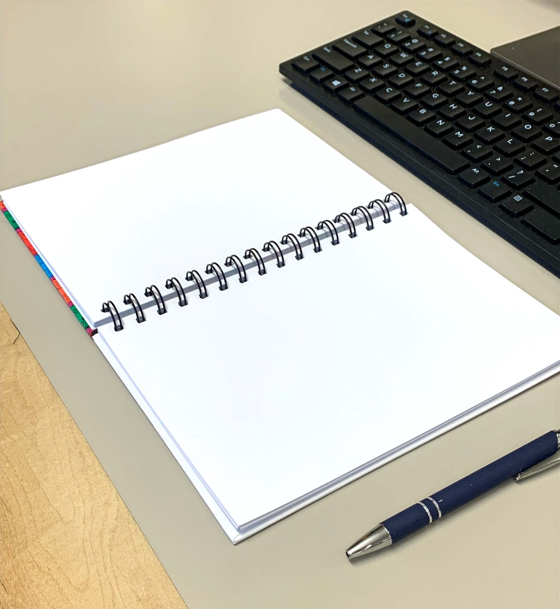 Boston MBTA grey notebook open on desk